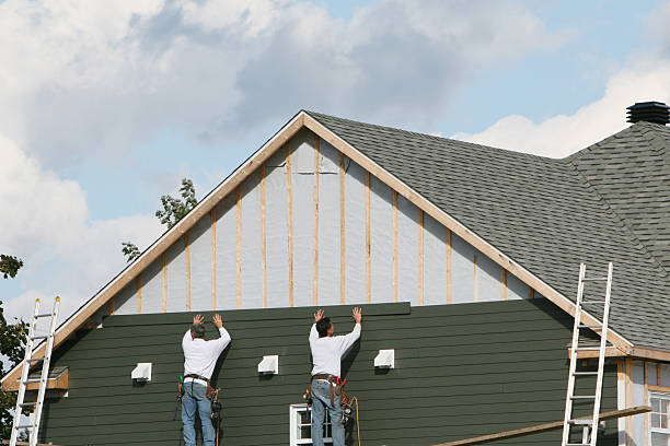Professional Siding Contractor technician working in Commodore, PA